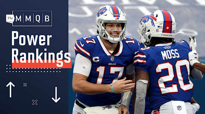 Bills quarterback Josh Allen celebrates a touchdown with running back Zack Moss against the Dolphins.